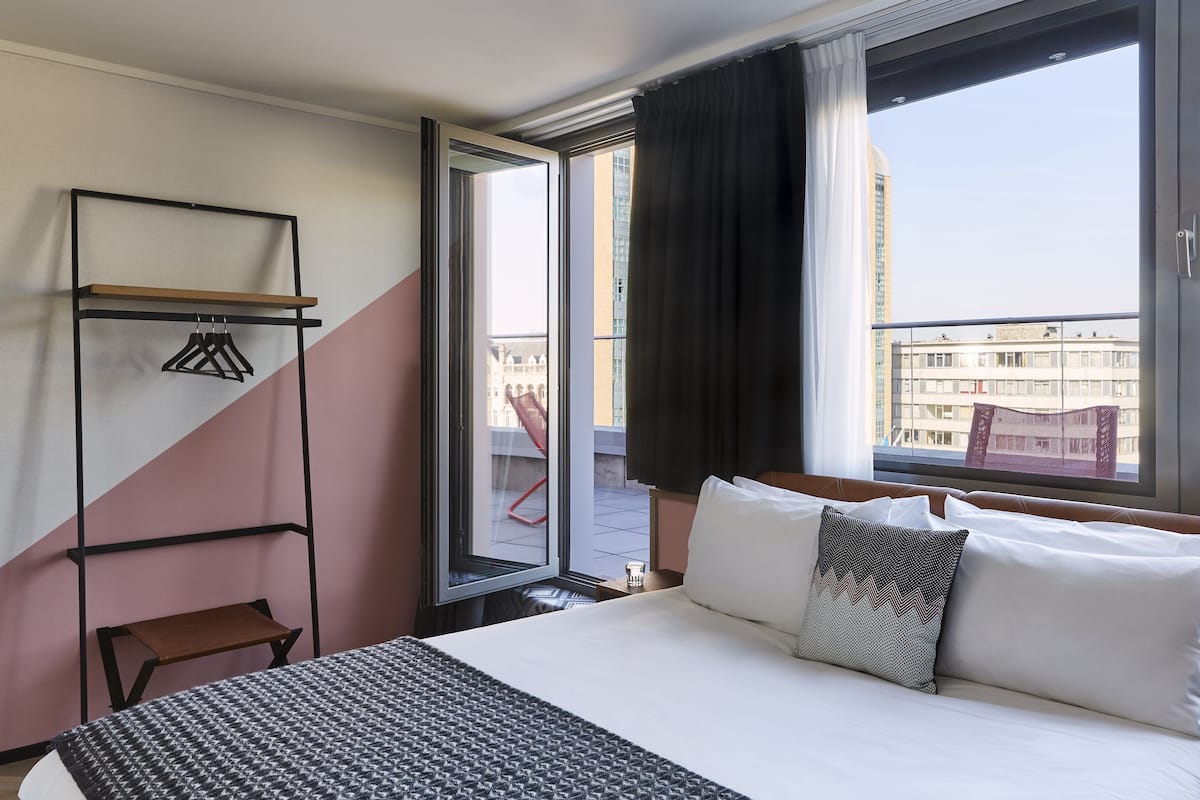 premium room, 1 double bed, balcony, city view | 1 bedroom, in-room safe, cots/infant beds, free wifi