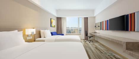 Minibar, coffres-forts dans les chambres, bureau, rideaux occultants