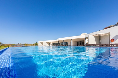 Indoor pool, outdoor pool, open 8:00 AM to 8:00 PM, sun loungers