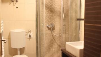 Shower, free toiletries, hair dryer, towels