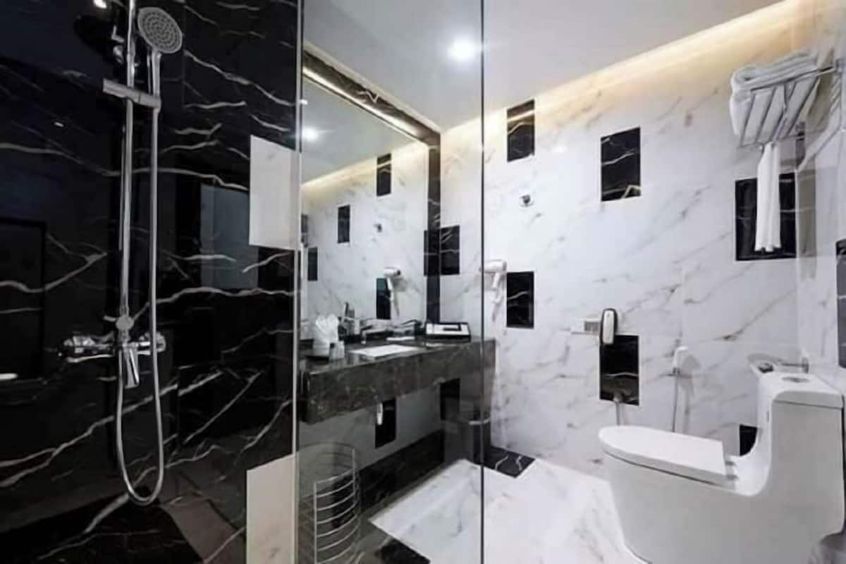 Bathroom | Shower, free toiletries, hair dryer, bathrobes