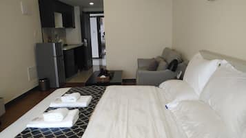 Premium bedding, desk, blackout curtains, soundproofing