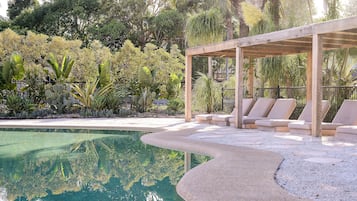 Outdoor pool, open 7:30 AM to 8 PM, pool loungers