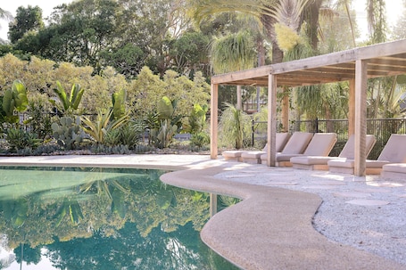 Outdoor pool, open 7:30 AM to 8 PM, sun loungers