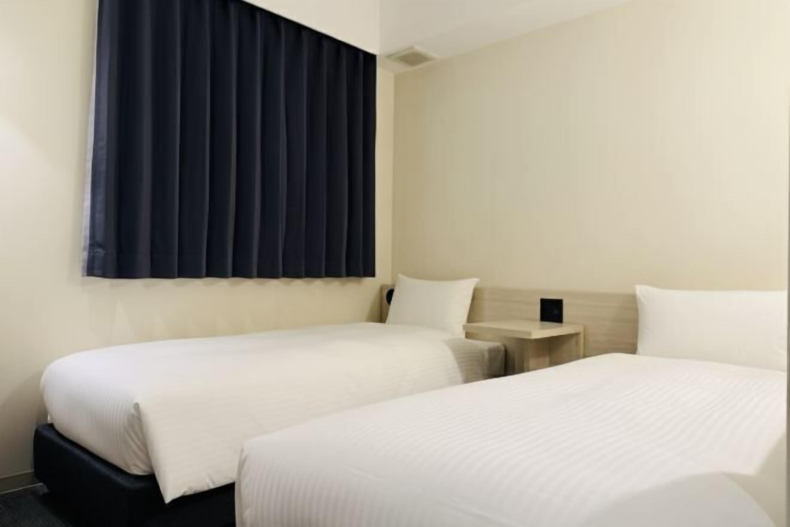 Hypoallergeen beddengoed, een bureau, een laptopwerkplek