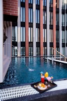 Outdoor pool, open 7:00 AM to 6:00 PM, pool umbrellas, sun loungers