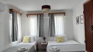 1 غرفة نوم وأغطية فراش متميزة وميني بار وبديكورات فريدة لكل غرفة