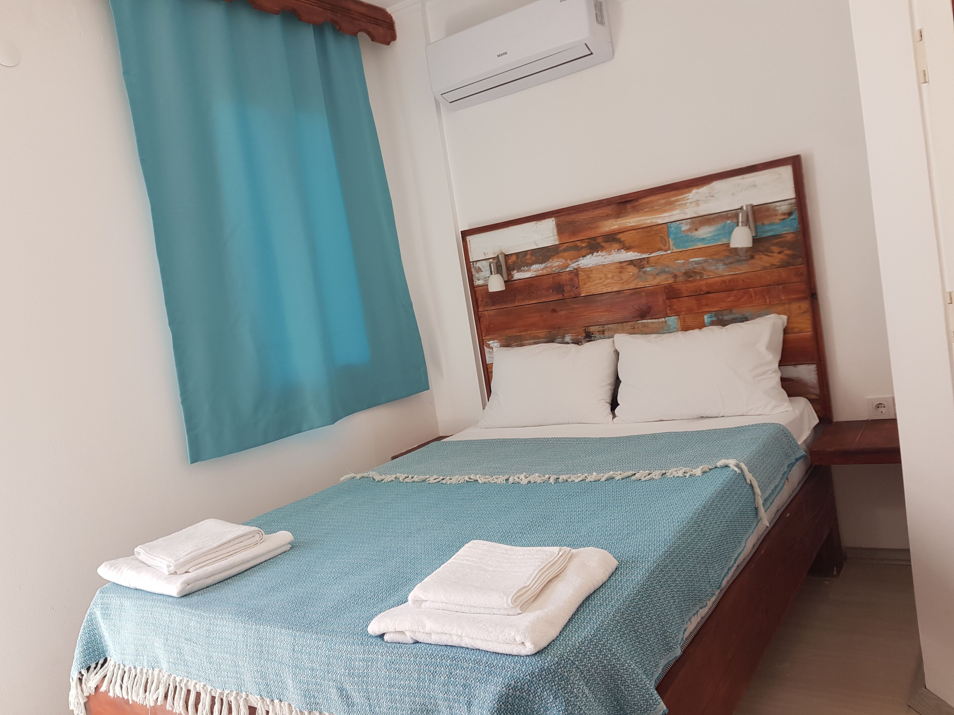 deluxe double room, 1 queen bed | premium bedding, minibar, individually decorated, individually furnished