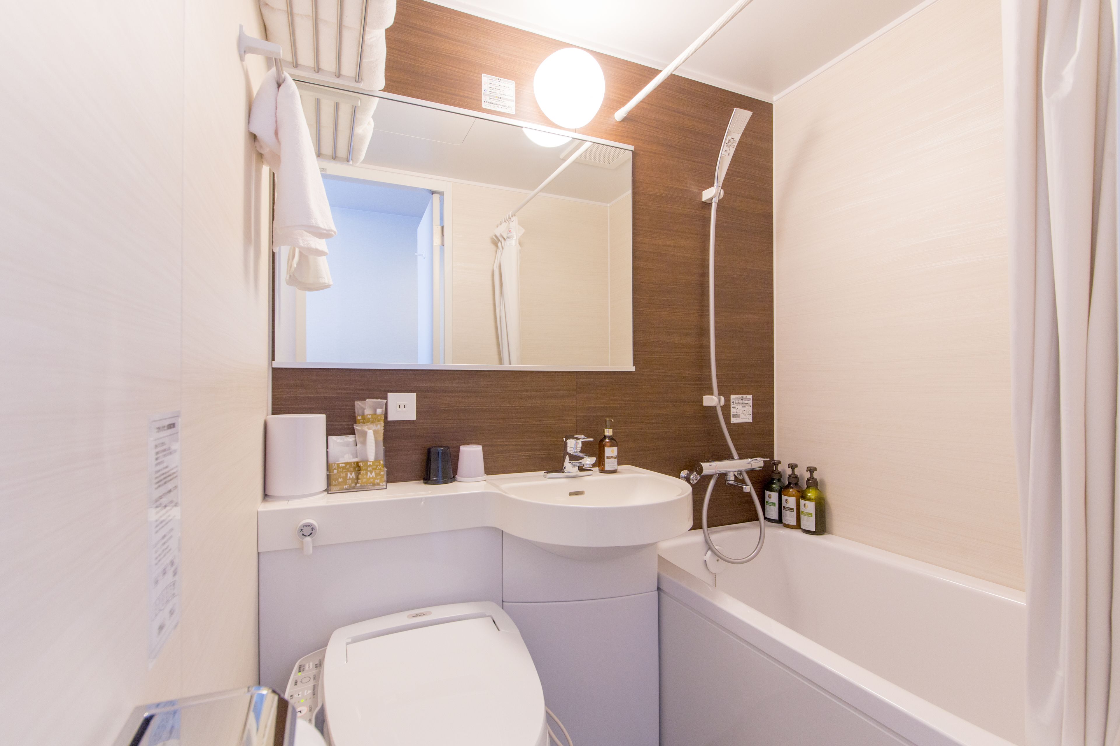 free toiletries, hair dryer, slippers, electronic bidet