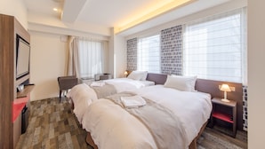 A hotel room with two beds, a TV, a desk, and a window with a view. - Hotel M’s Plus Shijo - Omiya (Kyoto)