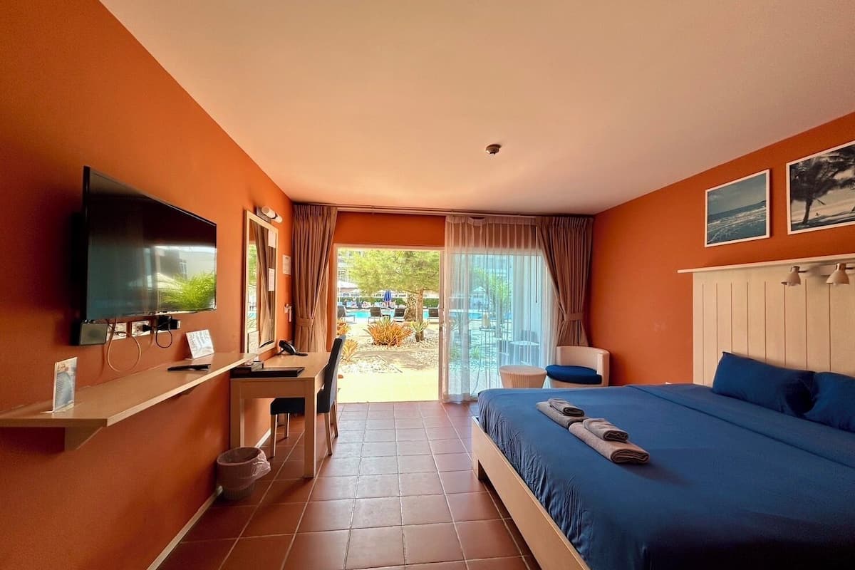 Deluxe Double Pool Access | 1 bedroom, in-room safe, desk, blackout curtains