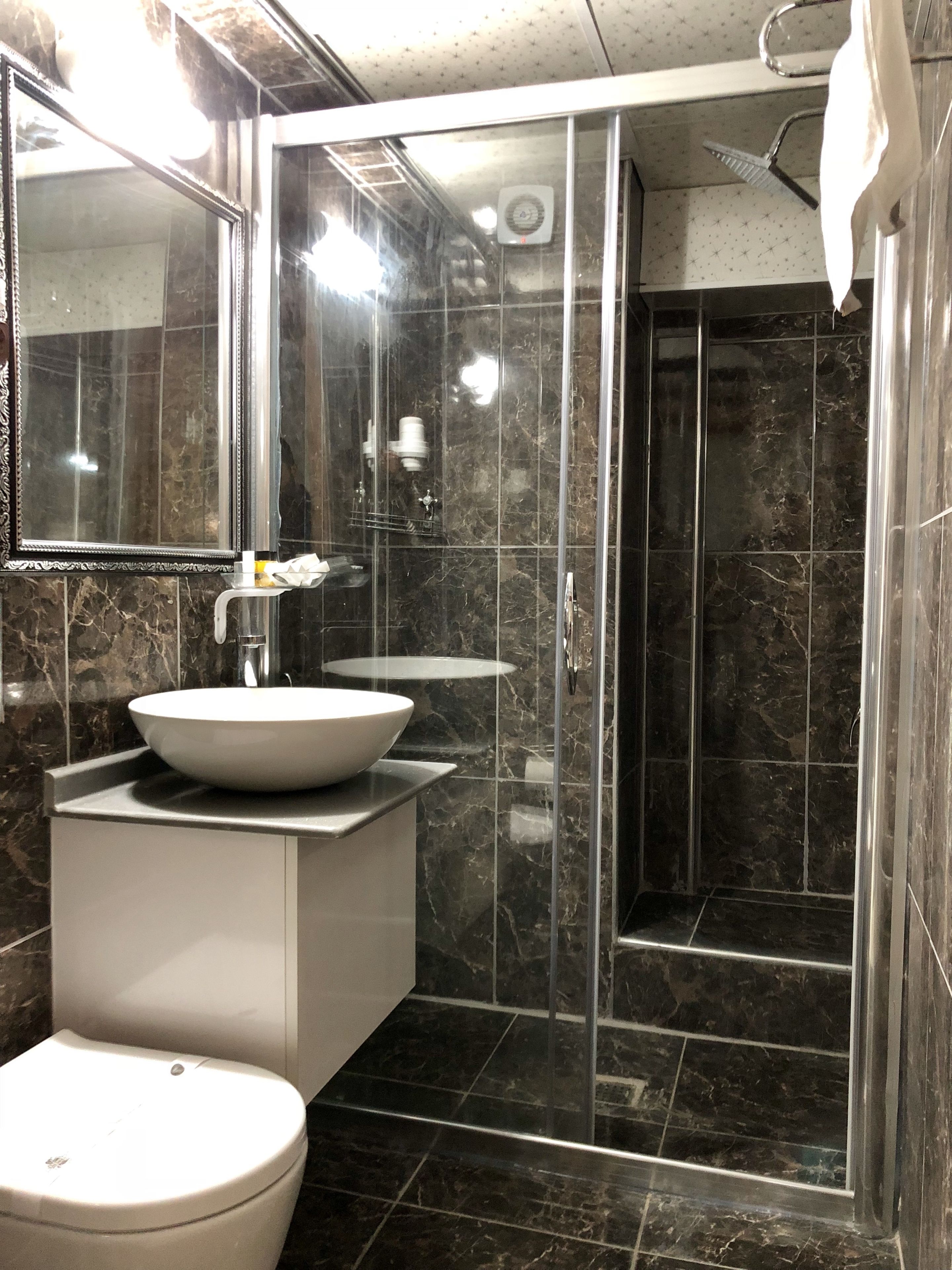 standard loft, 1 double bed, city view | bathroom | shower, rainfall showerhead, designer toiletries, hair dryer