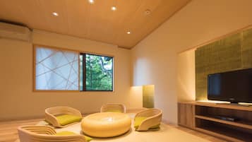Suite Room with Open Air Bath, SEN | Living room | Flat-screen TV