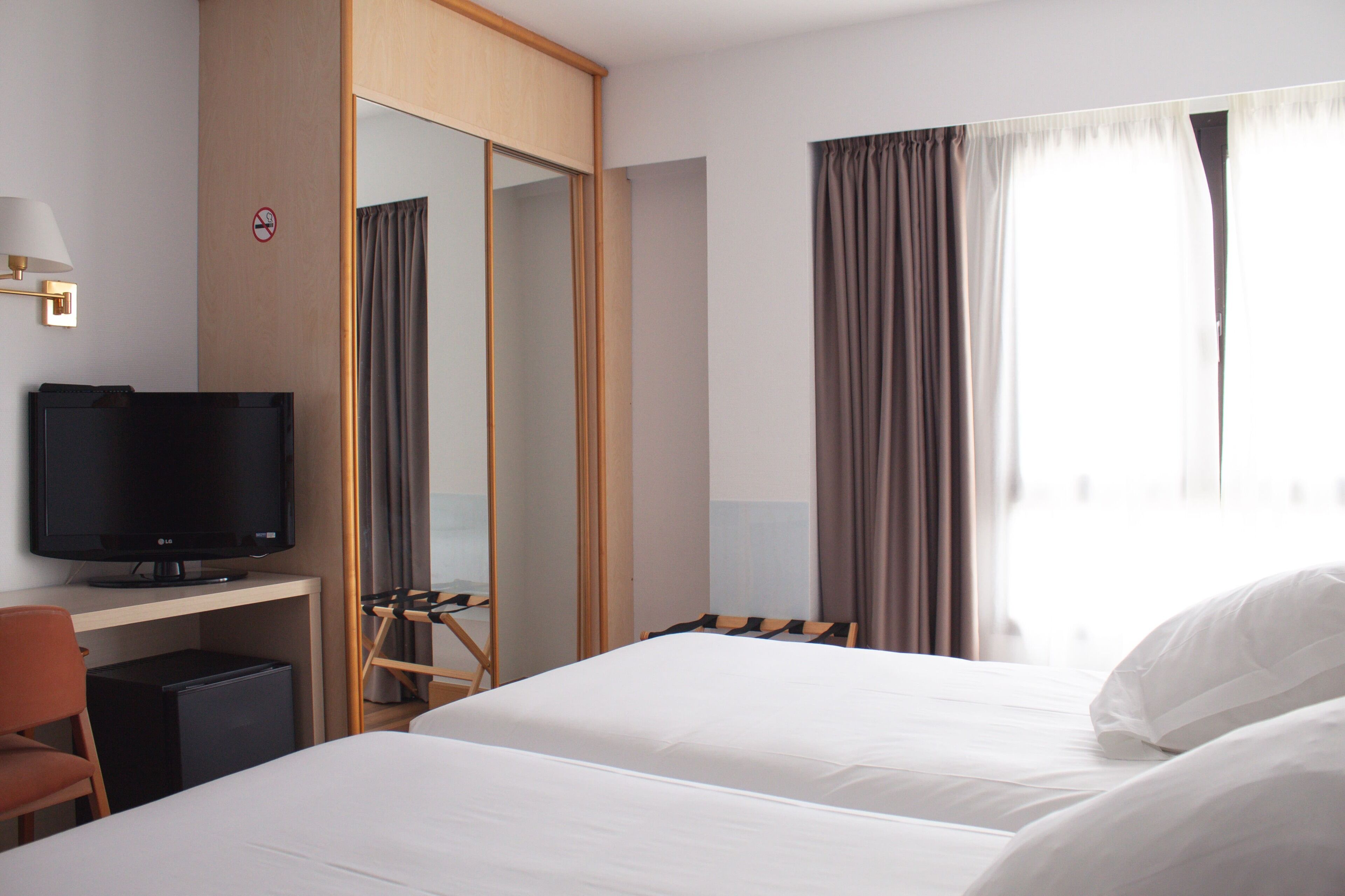 double or twin room | in-room safe, desk, iron/ironing board, free wifi