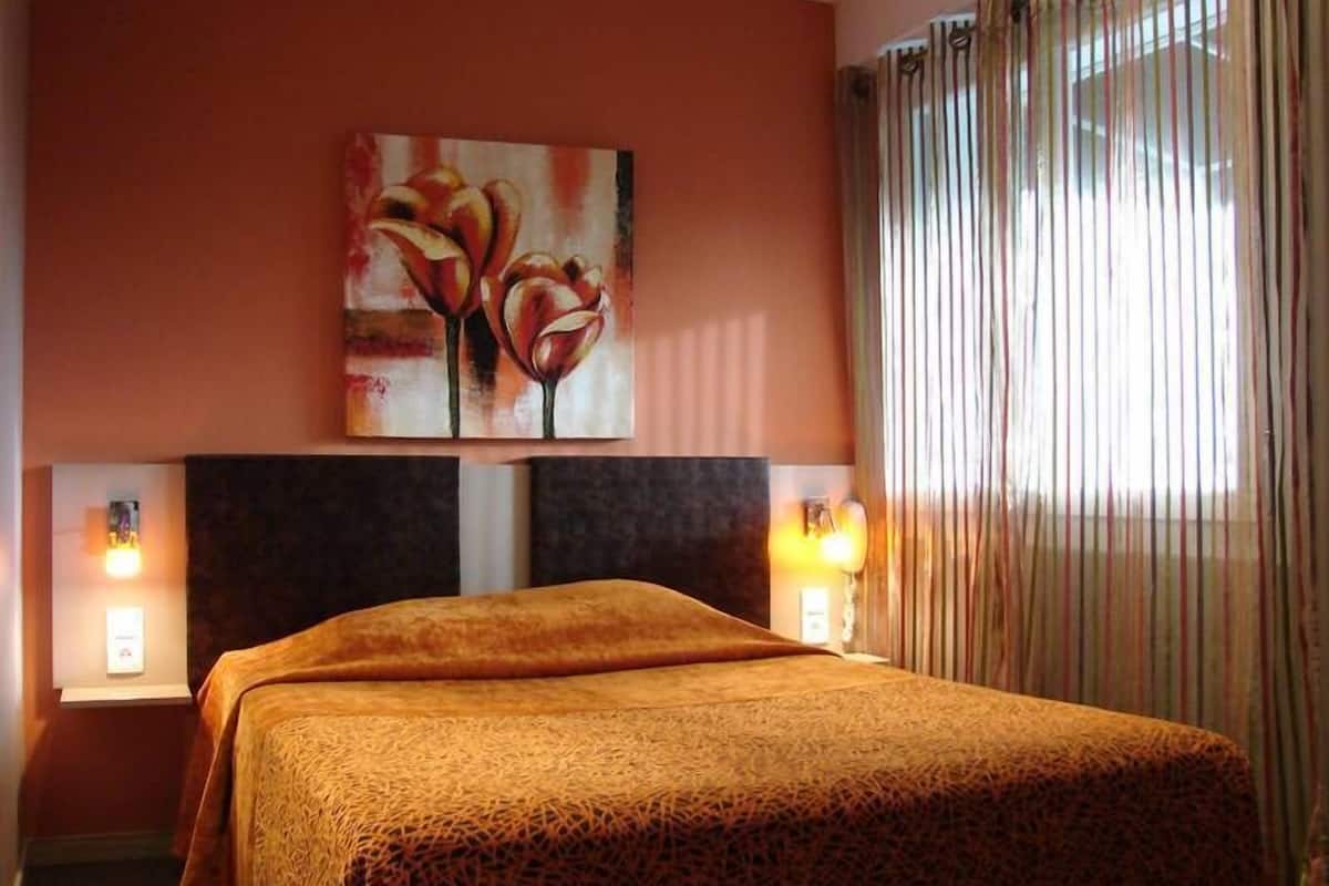 Blackout curtains, soundproofing, iron/ironing board (on request)