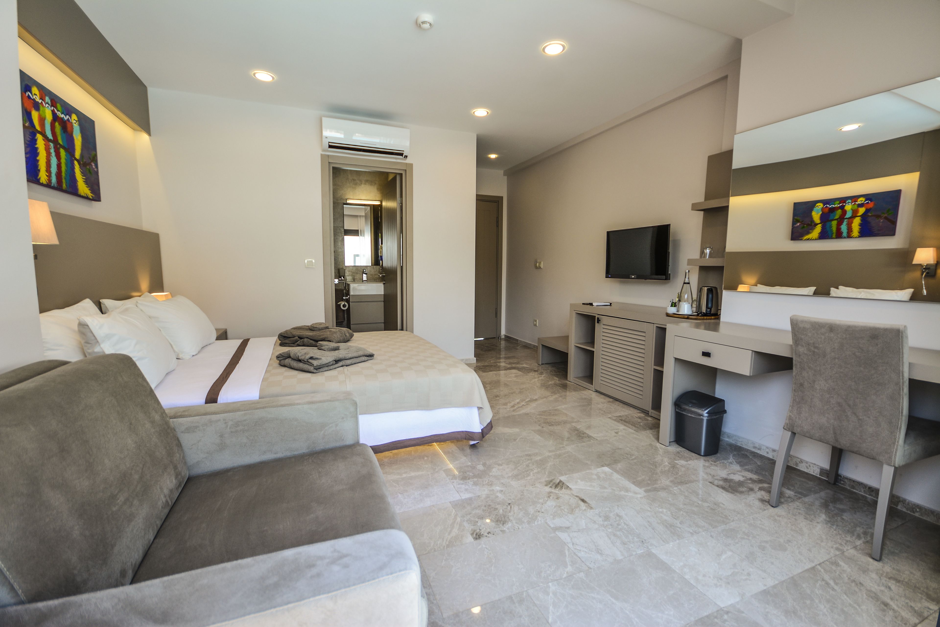 superior room | in-room safe, desk, laptop workspace, iron/ironing board