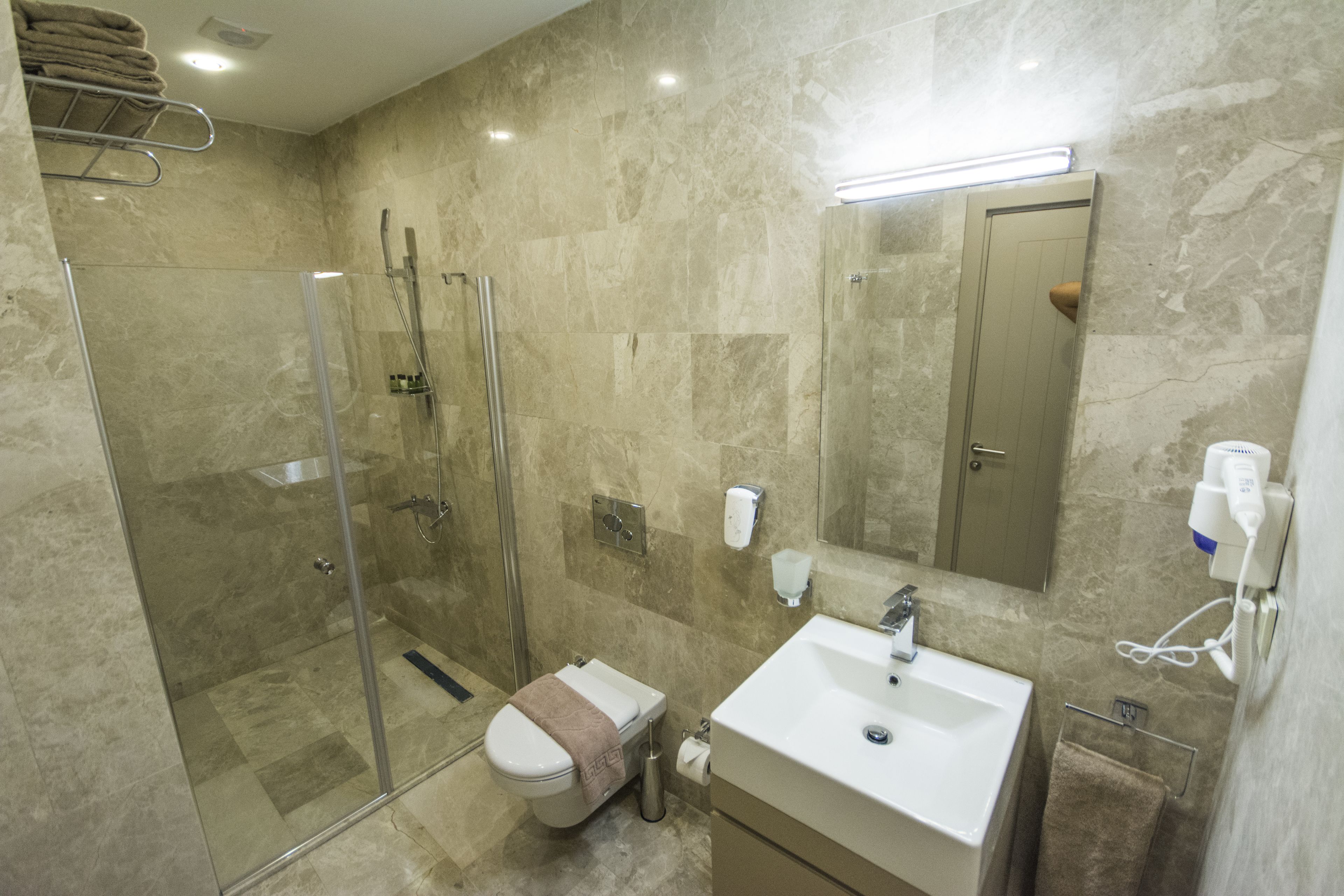 shower, free toiletries, hair dryer, slippers