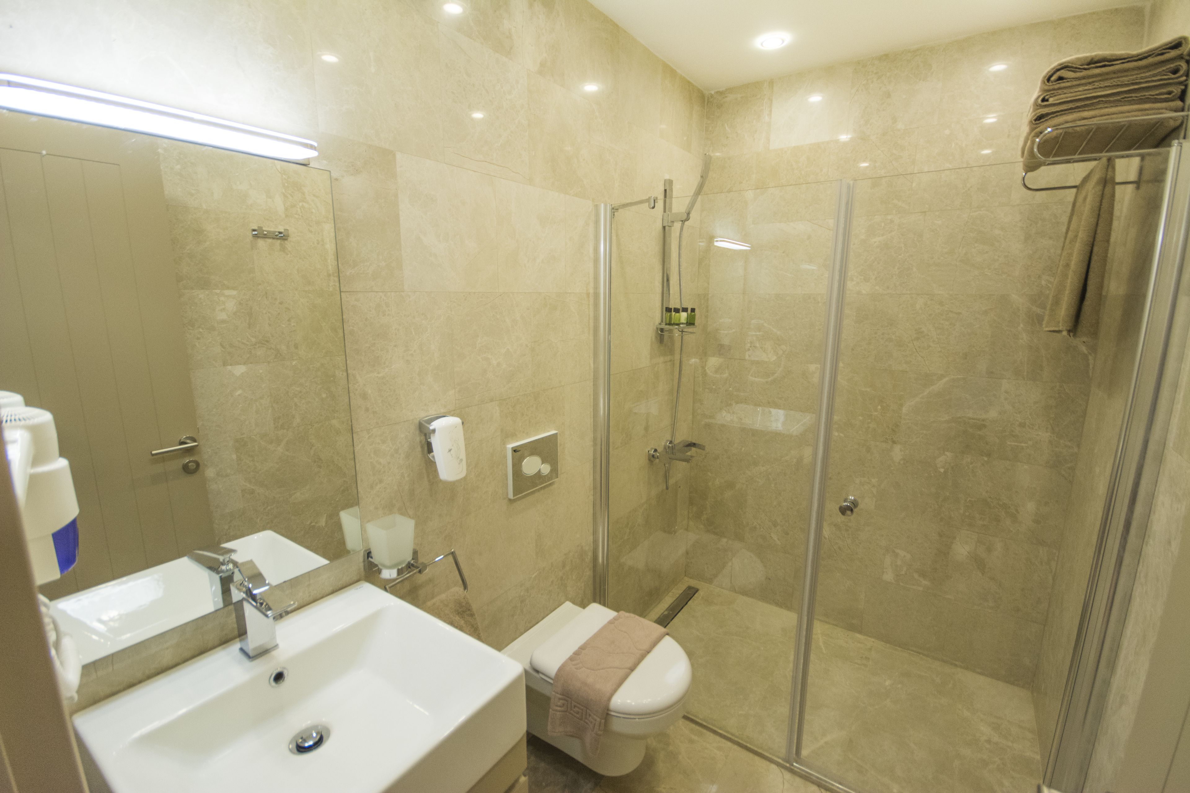 shower, free toiletries, hair dryer, slippers