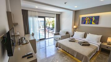 Deluxe Room, Pool View | In-room safe, desk, laptop workspace, iron/ironing board (on request)