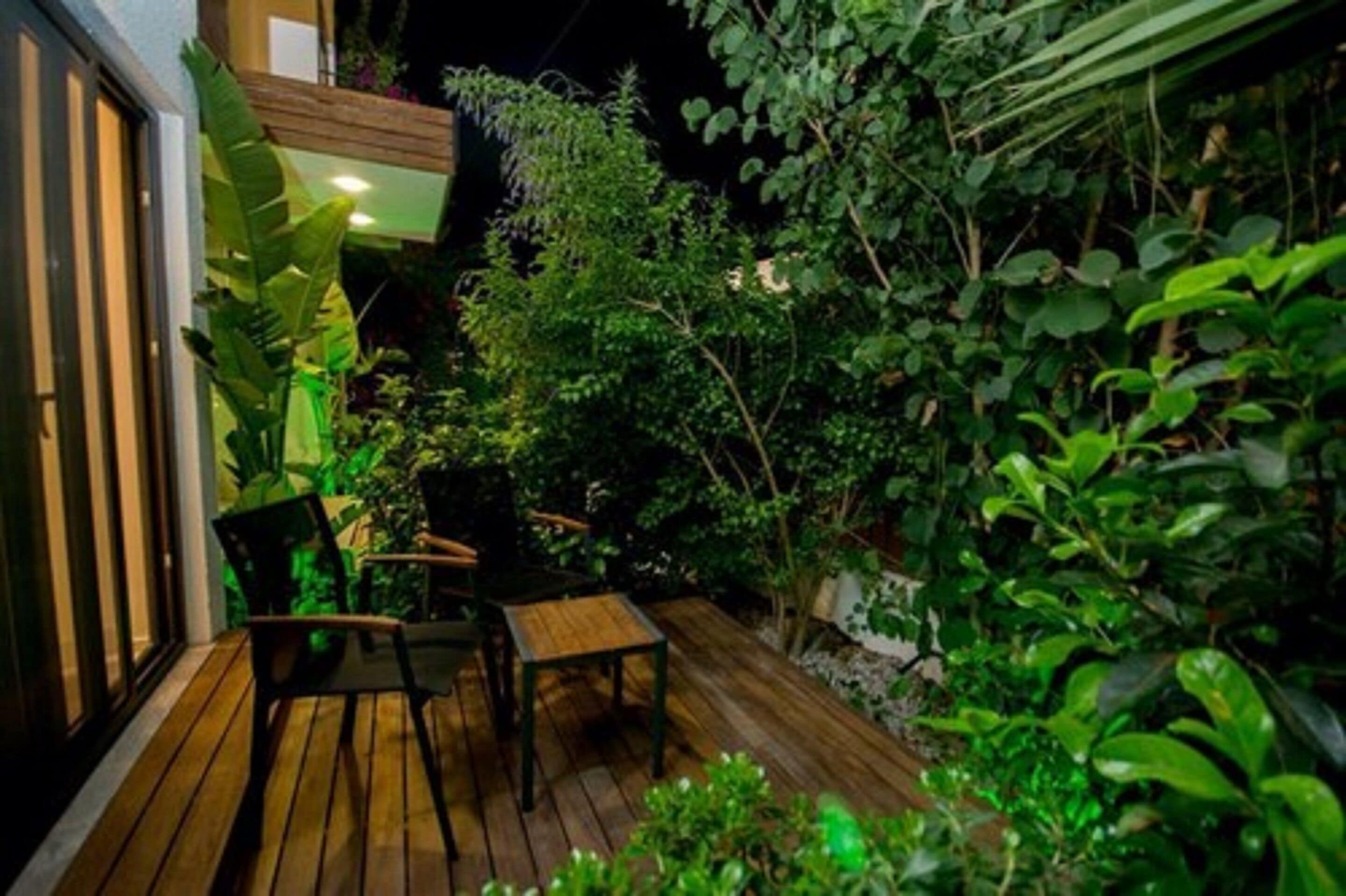 deluxe room, garden area | terrace/patio