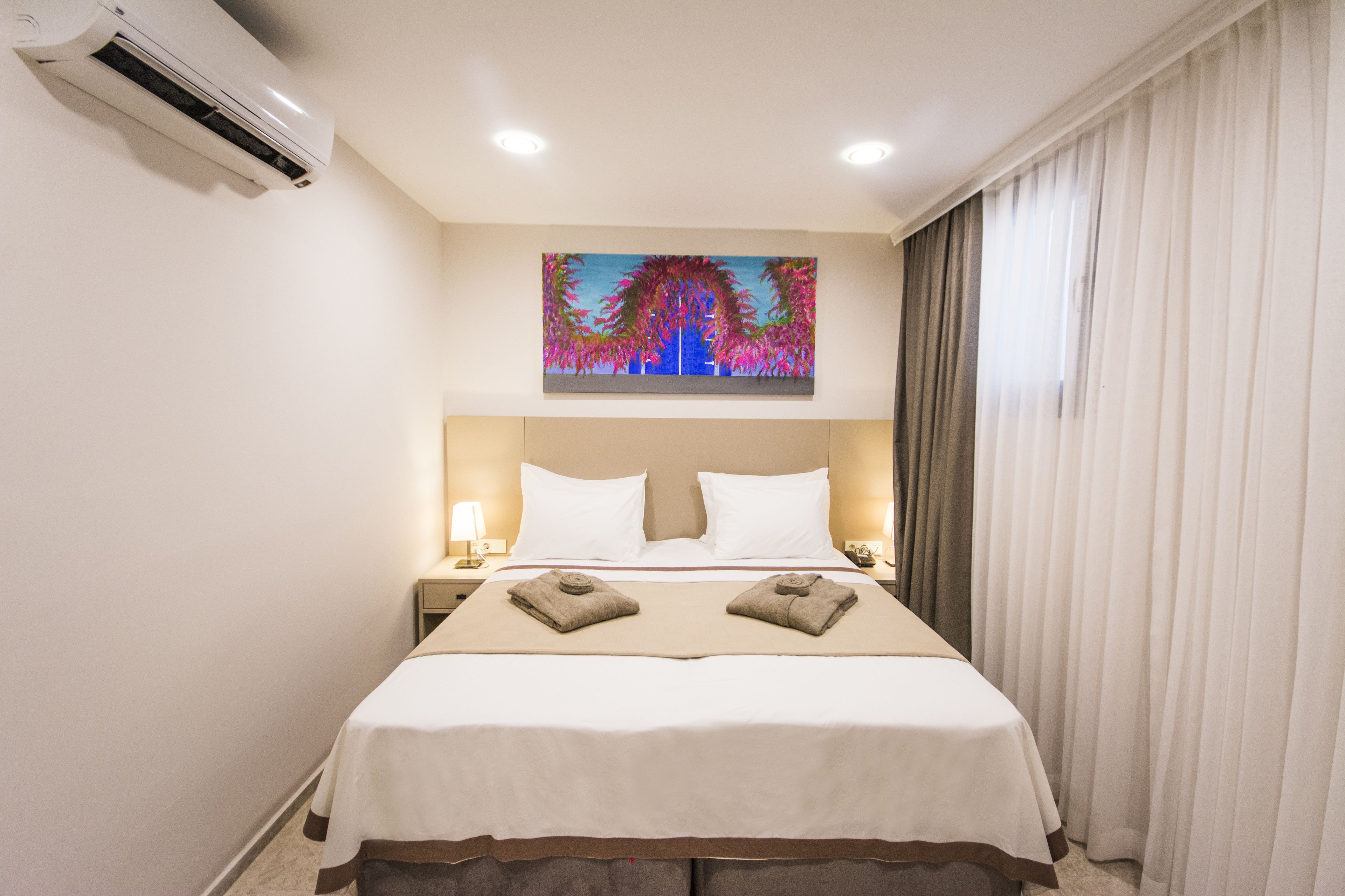 family room | in-room safe, desk, laptop workspace, iron/ironing board