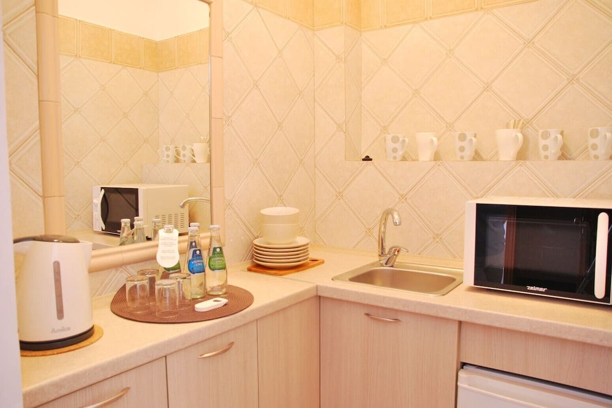 economy apartment | 1 bedroom, in-room safe, desk, iron/ironing board