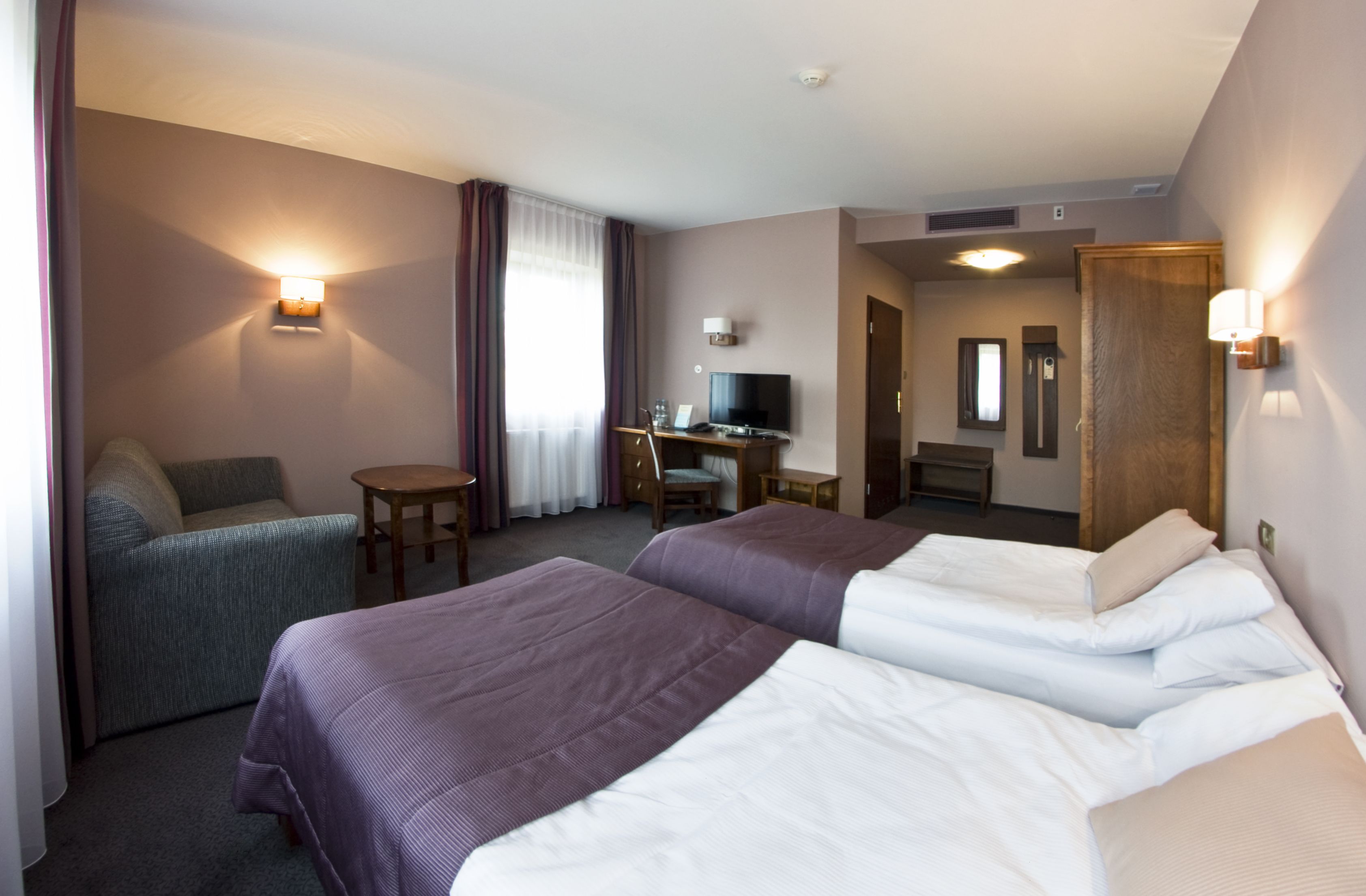 deluxe triple room (unlimited spa access) | 1 bedroom, in-room safe, desk, iron/ironing board