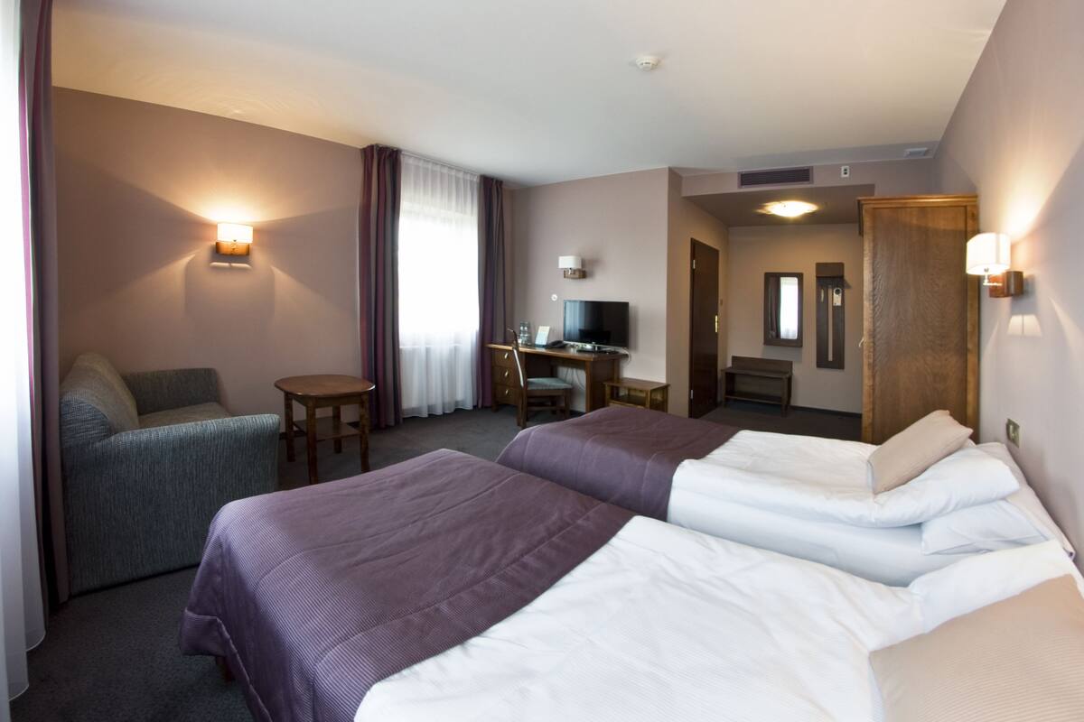 deluxe triple room (unlimited spa access) | 1 bedroom, in-room safe, desk, iron/ironing board