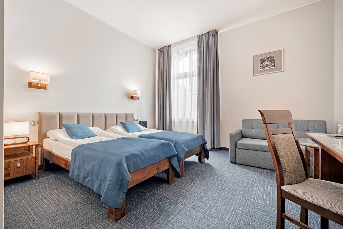 Deluxe Triple Room (unlimited spa access) | In-room safe, desk, iron/ironing board, free WiFi