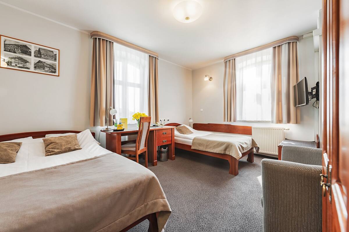 standard triple room (100min spa access) | 1 bedroom, in-room safe, desk, iron/ironing board