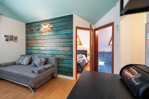 Apartment, Sea View | Living area | Plasma TV