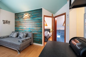 Appartement, uitzicht op zee | Woonruimte | Plasmatelevisie