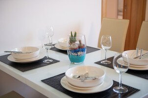 Apartment, Sea View | Living area | Plasma TV