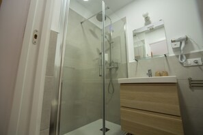 Double Room (with Bathroom Outside and Window) | Bathroom | Hair dryer, soap, toilet paper - The Nomad Hostel (Seville)