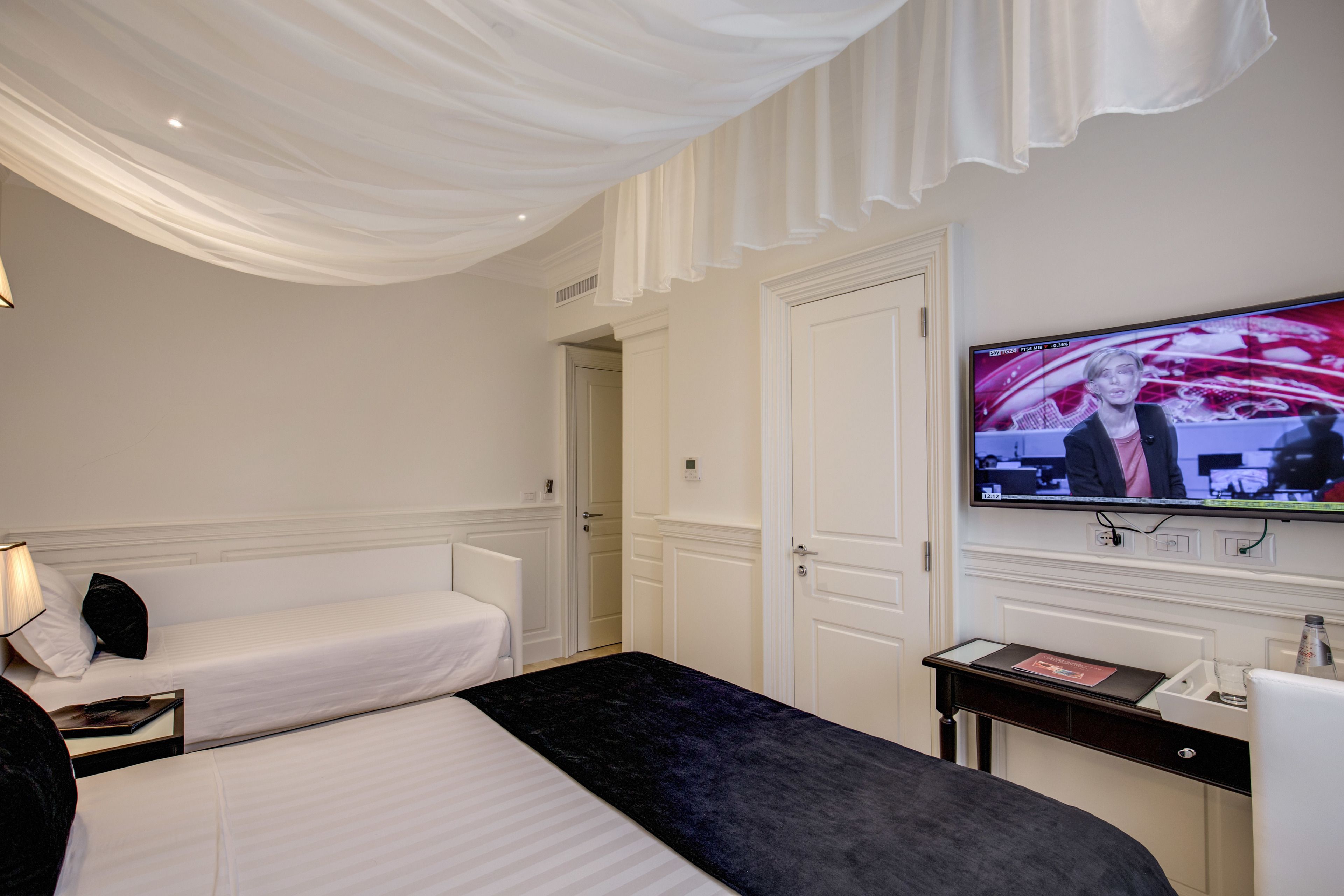 triple room | premium bedding, minibar, in-room safe, individually decorated