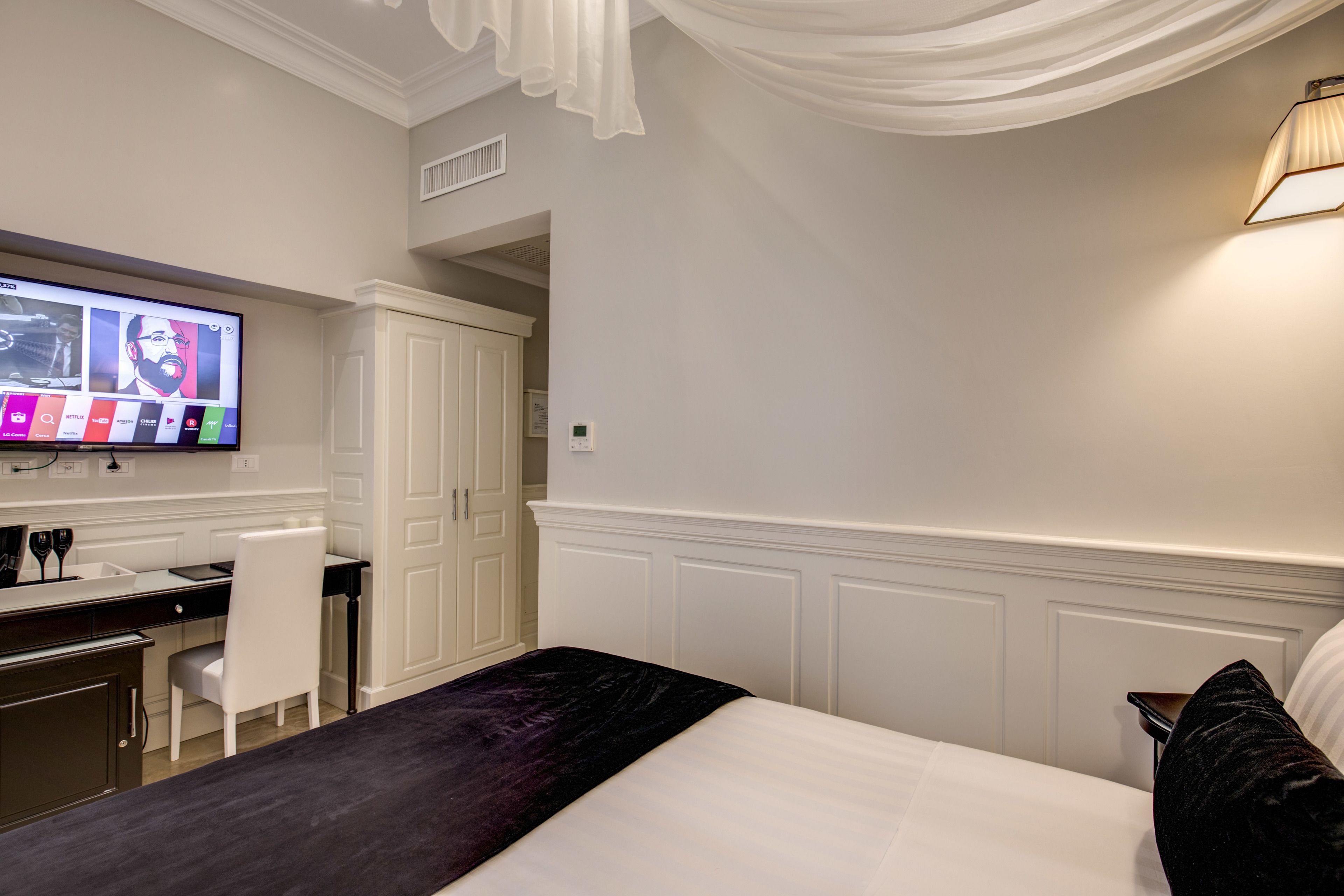 economy double room | premium bedding, minibar, in-room safe, individually decorated