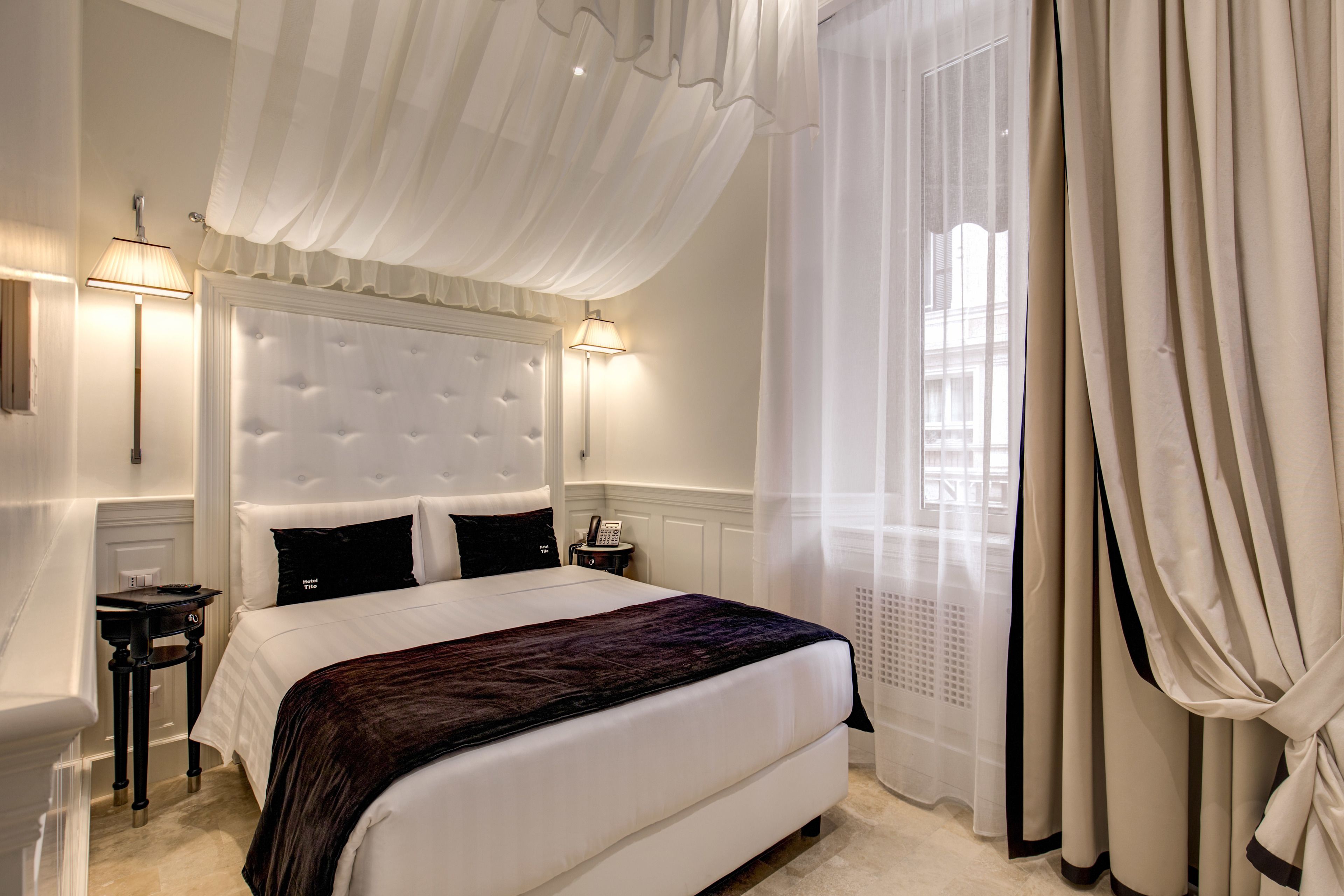 economy double room | premium bedding, minibar, in-room safe, individually decorated