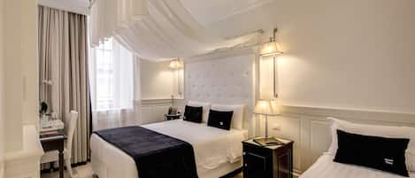 Triple Room | Premium bedding, minibar, in-room safe, individually decorated