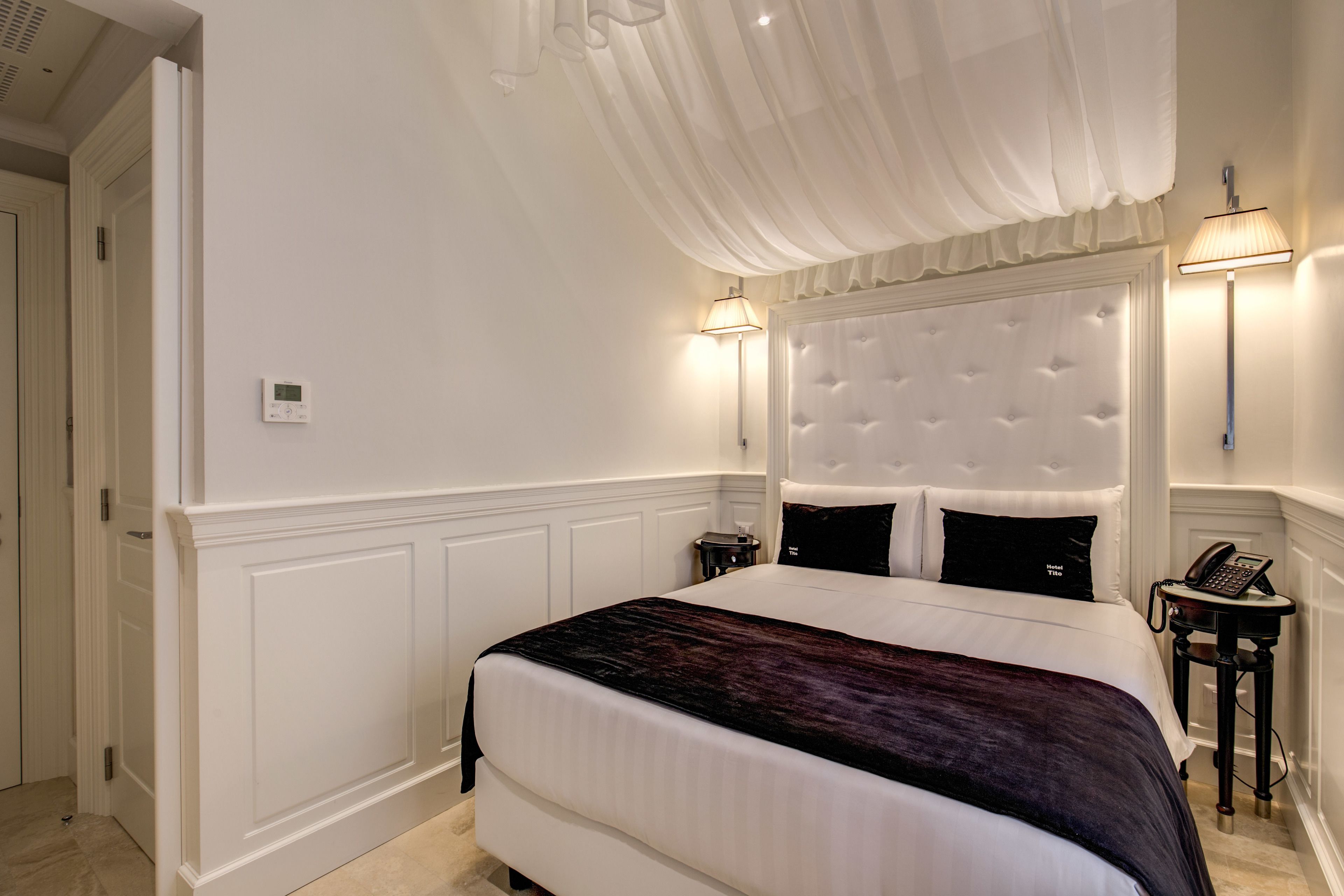 economy double room | premium bedding, minibar, in-room safe, individually decorated