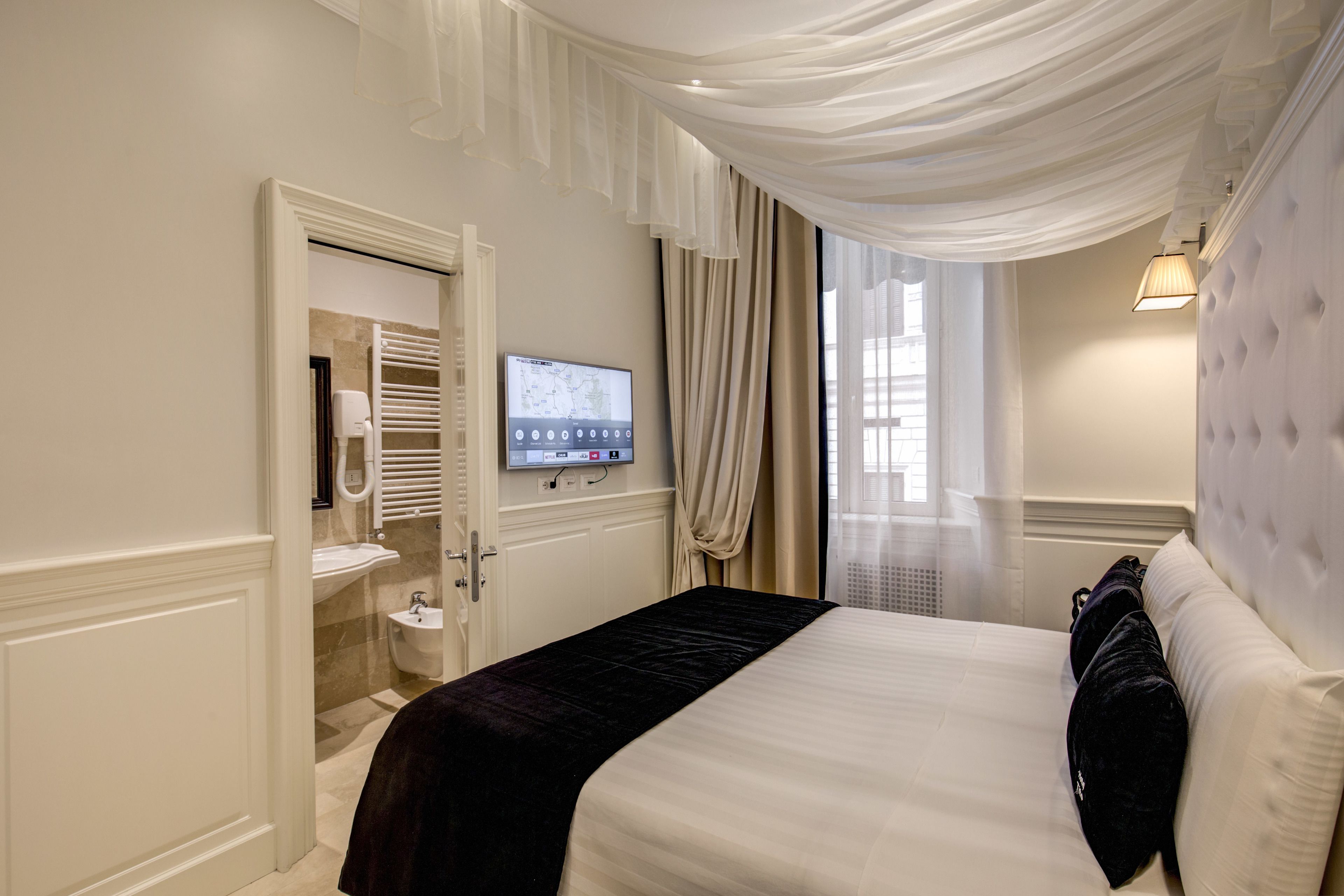 standard double or twin room | premium bedding, minibar, in-room safe, individually decorated