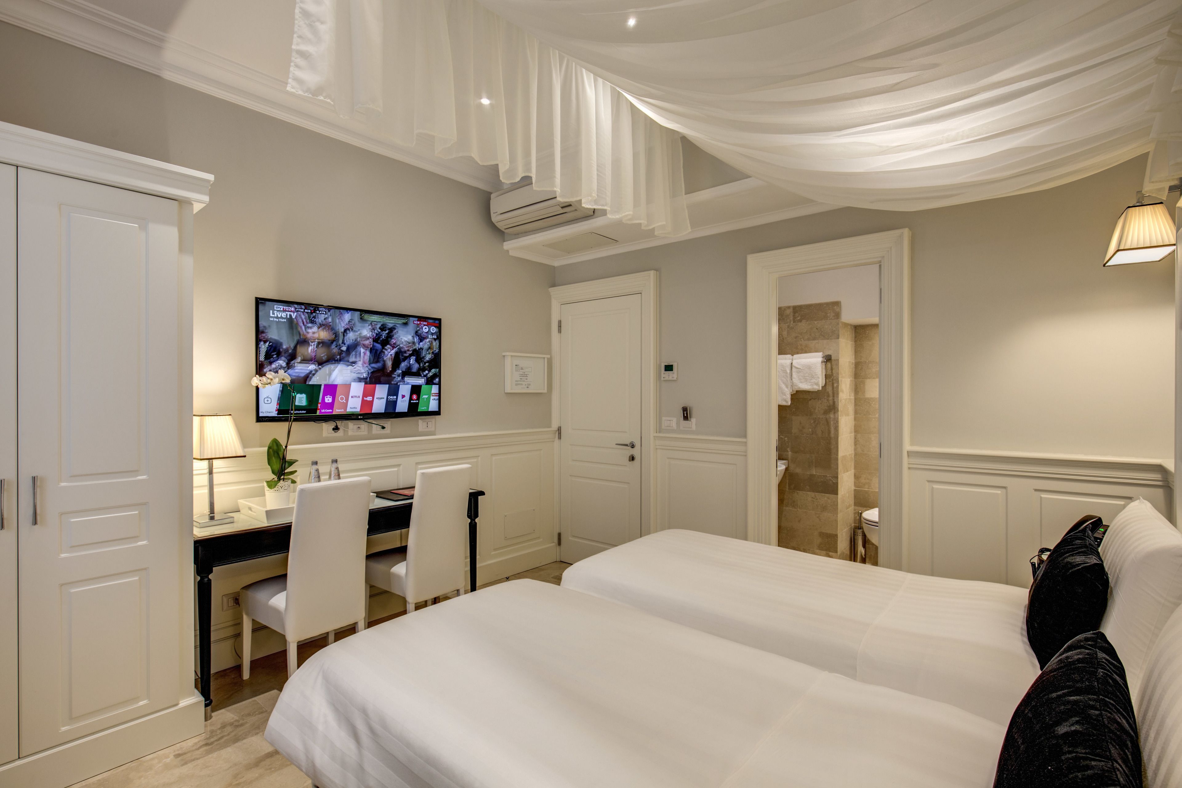 standard double or twin room | premium bedding, minibar, in-room safe, individually decorated