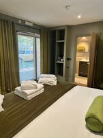 Garden Room - Hot Tub | Desk, blackout drapes, iron/ironing board, WiFi (free)