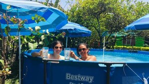 A backyard pool area with a blue inflatable pool labeled "Bestway Steel Pro MAX." - Hotel Your House (Rio Segundo)