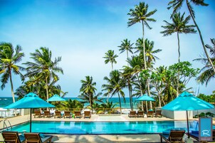 On the beach, sun-loungers, beach umbrellas