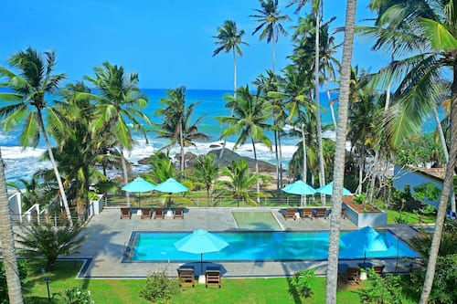 Outdoor pool, pool umbrellas, pool loungers