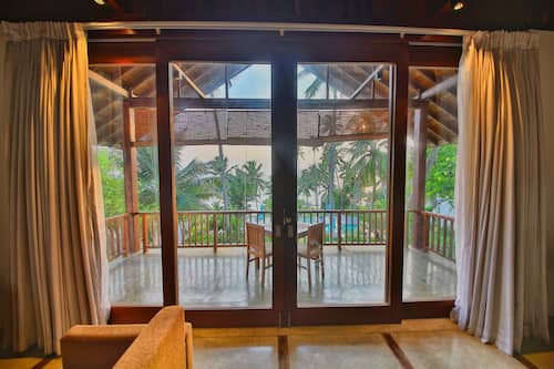 Suite with Sea View - 15% off on Spa Treatments | Premium bedding, minibar, in-room safe, desk