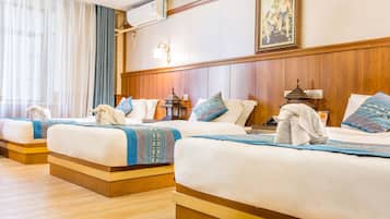 Elite Triple Room | Minibar, desk, blackout drapes, free WiFi