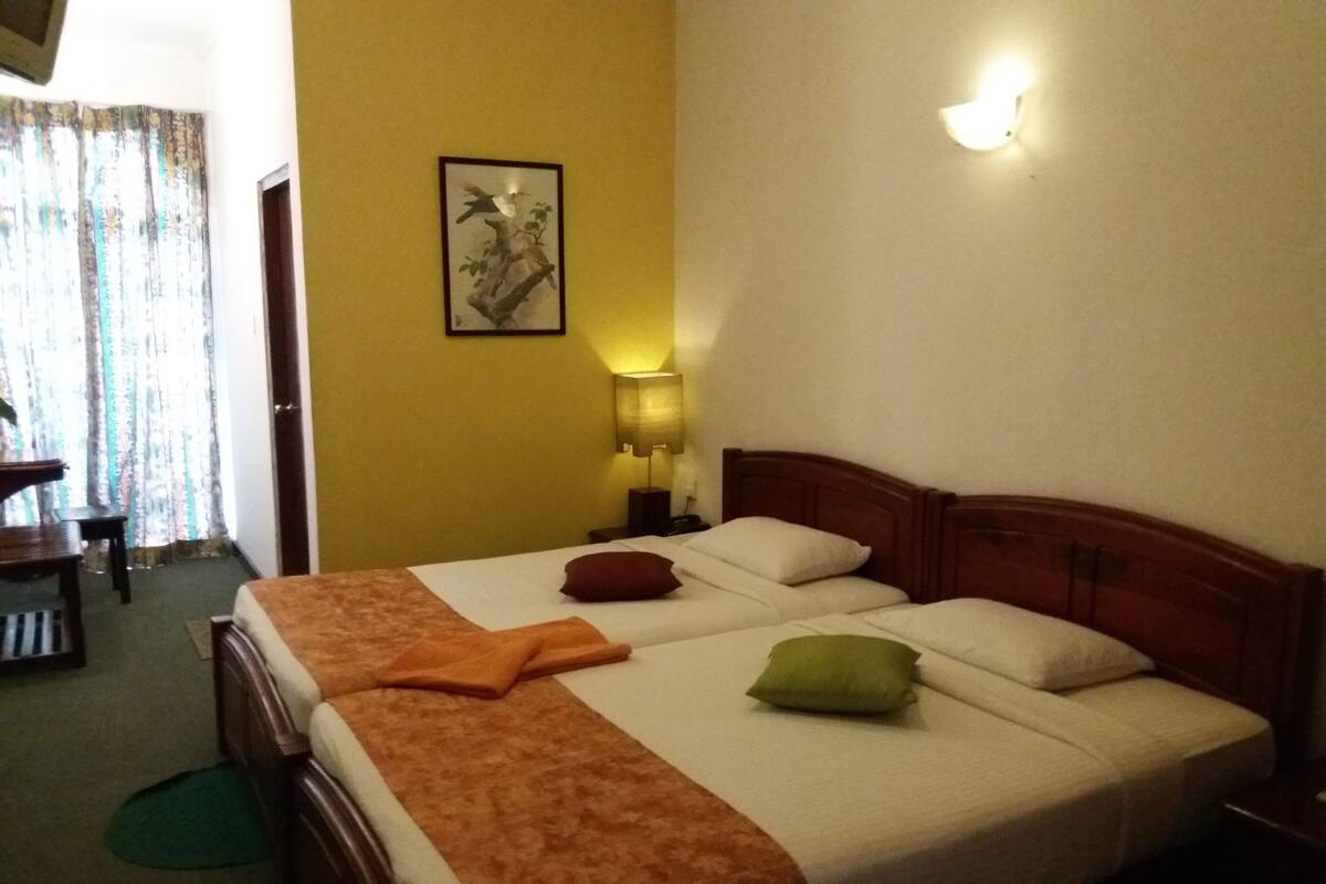 Deluxe Double Room, Balcony, Mountain View | In-room safe, desk, iron/ironing board, rollaway beds