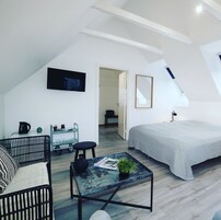 Quarto quádruplo standard | Wi-Fi de cortesia, roupa de cama