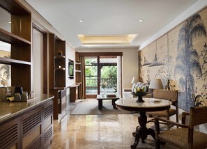 Adiwana Suite Room | Living room | 42-inch LCD TV with cable channels, TV, fireplace - Adiwana Resort Jembawan (Ubud)